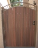 arched decorative gate with tan steel and redwood composite
